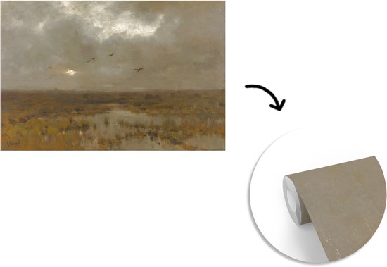 Une peinture d'un marais avec un ciel sombre et des oiseaux en vol, à côté d'un rouleau de papier peint.