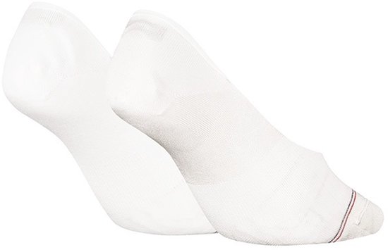 Witte Tommy Hilfiger footies met Tommy Hilfiger logo en een rode/blauwe streep.