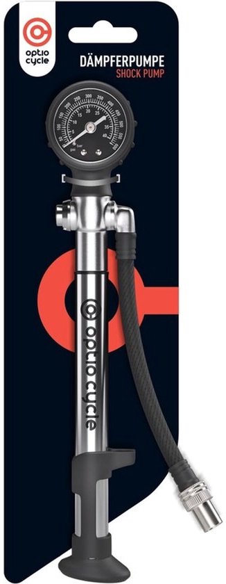 Zilverkleurige Optio Cycle schokdemper pomp met zwarte manometer en flexibele slang op een productkaart.