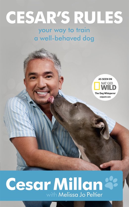 Boek "Cesar's Rules" met Cesar Millan die een hond kust. Cesar Millan met Melissa Jo Peltier.