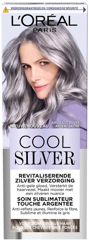 Model met glanzend, zilverkleurig haar en L'Oréal Paris Cool Silver verpakking. "Nieuw/Nouveau, Absoluut Zilver, Argent Satiné".