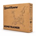Doos van de Sportfloww hometrainer met een schets van de fiets en specificaties op de zijkant.
