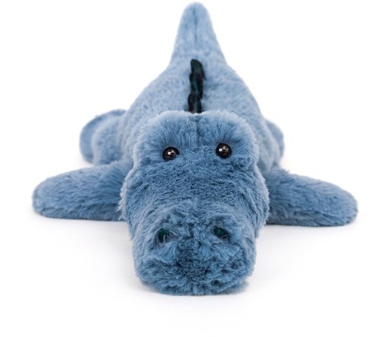 Blauwe dino knuffel met grote ogen, liggend op de buik.