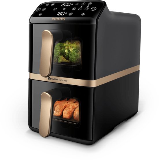 Zwarte Philips Airfryer met gouden accenten en dubbele lades. Eén lade bevat broccoli, de andere kip.