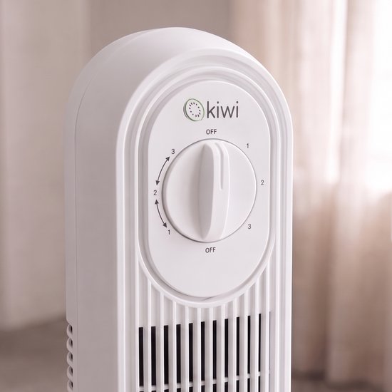 Detail van de witte torenventilator met 'kiwi' logo en de instelknop met standen 1, 2, 3 en 'OFF'.