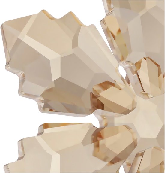 Gouden kristallen kerstster met facetten, hangend aan rood lint.