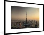 Fotolijst incl. Poster - Zonsondergang achter de Burj Khalifa en Dubai - 120x80 cm - Posterlijst