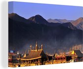 Le Temple du Jokhang avec les montagnes en arrière-plan Lhassa Tibet Toile 60x40 cm - Tirage photo sur toile (Décoration murale salon / chambre)