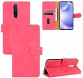 Voor Xiaomi Redmi K30 Ultra-effen kleur Skin Feel Magnetische gesp Horizontale flip-kalftextuur PU-lederen tas met houder & kaartsleuven & portemonnee (Rose Red)