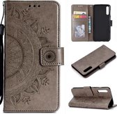 Voor Sony Xperia 10 II Totem Bloem Reliëf Horizontale Flip TPU + PU lederen tas met houder & kaartsleuven & portemonnee (grijs)