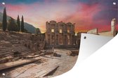 Tuindecoratie Zonsopkomst achter de bibliotheek van Celsus in Turkije - 60x40 cm - Tuinposter - Tuindoek - Buitenposter