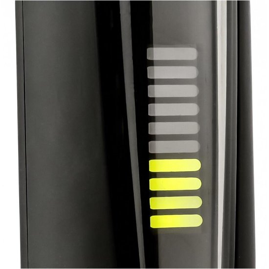 Close-up van de batterij-indicator op een zwarte Remington tondeuse.