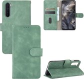 Voor OnePlus Nord Effen kleur Skin Feel Magnetische gesp Horizontale flip kalftextuur PU lederen hoes met houder & kaartsleuven & portemonnee (groen)