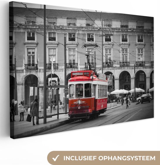Canvas Schilderij Zwart-wit foto met een rode tram - 90x60 cm - Wanddecoratie