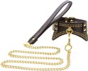 Zwarte taboom kraag met gouden studs en ketting, met handvat.