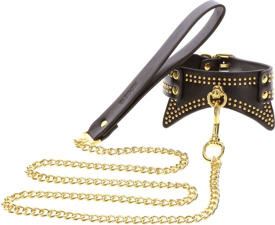 Zwarte taboom kraag met gouden studs en ketting, met handvat.
