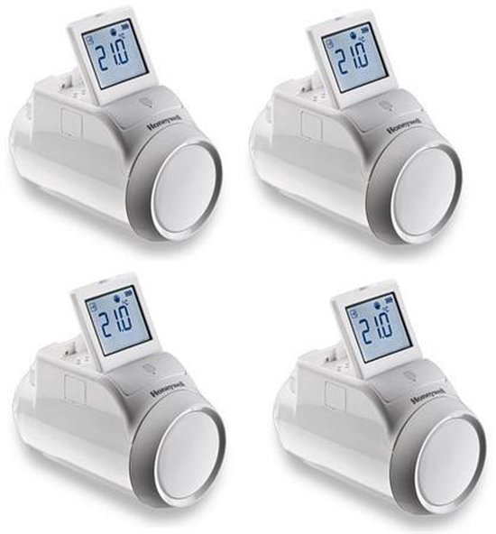 Vier witte Honeywell radiatorthermostaten, elk met een display waarop 21.0 wordt weergegeven.