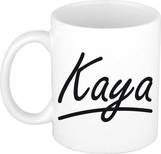 Tasse blanche avec le nom 'Kaya' en lettres noires stylisées.