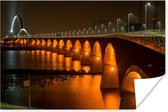 Verlichting van de Waalbrug in de Nederlandse stad Nijmegen Poster 30x20 cm - klein - Foto print op Poster (wanddecoratie woonkamer / slaapkamer) / Europese steden Poster