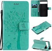 Voor Google Pixel 6 Boom & Kat Reliëfpatroon Horizontale Flip Lederen Case met Houder & Kaartsleuven & Portemonnee & Lanyard (Groen)