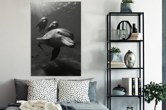 Tableau sur toile Photo sous-marine de trois dauphins - noir et blanc - 80x120 cm - Décoration murale