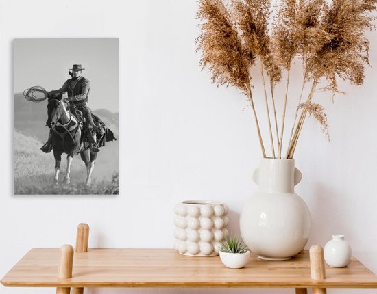 Peinture sur toile Un cow-boy sur un cheval gris ciel - noir et blanc - 20x30 cm - Décoration murale