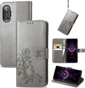 Voor Xiaomi Redmi K40 Gaming / Poco F3 GT Vierbladige sluiting Reliëfgesp Mobiele telefoonbescherming Lederen tas met lanyard & kaartsleuf & portemonnee & beugelfunctie (grijs)