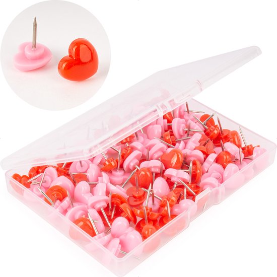 Een opbergdoos met rode en roze hartvormige punaises, met inzet van twee punaises.