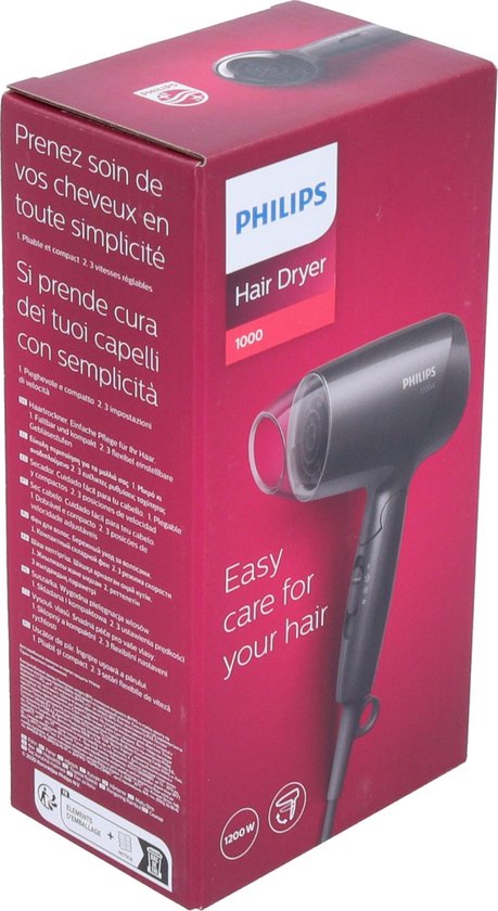Verpakking van zwarte Philips föhn met tekst 'Prenez soin de vos cheveux en toute simplicité' en 'Easy care for your hair'.