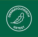 Groen-witte cirkel met een veertje. Tekst: 'Dermatologisch getest'.