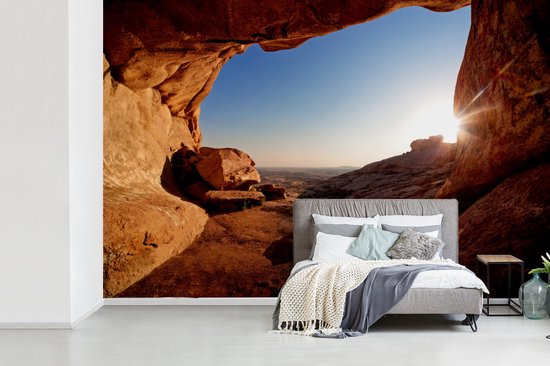Behang - Fotobehang Grot - Woestijn - Zon - Landschap - Breedte 525 cm x hoogte 350 cm