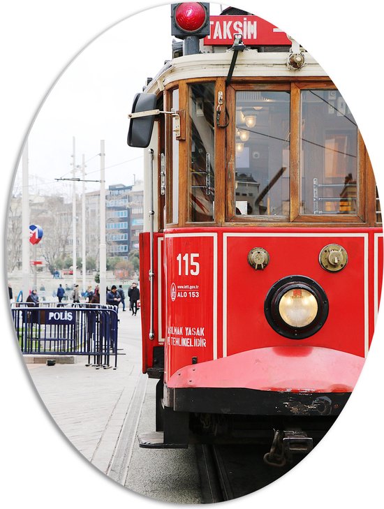 WallClassics - PVC Schuimplaat Ovaal - Rode Tram door de Stad - 72x96 cm Foto op Ovaal (Met Ophangsysteem)