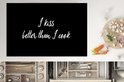 Zwarte kookplaatbeschermer met witte tekst "I kiss better than I cook", met ingrediënten.