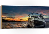 WallClassics - Hout - Schip op het Water met Oranje Lucht - 100x50 cm - 12 mm dik - Foto op Hout (Met Ophangsysteem)