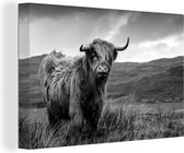 Tableau sur toile Highlander écossais sur une île écossaise - noir et blanc - 140x90 cm - Décoration murale