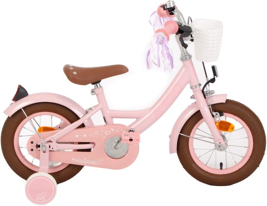 Vélo enfant rose avec panier, rubans et roulettes.