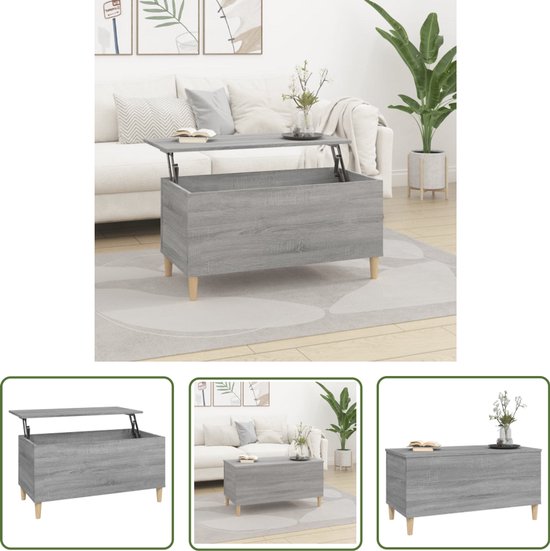 Grijze salontafel met houtnerf en opklapbaar blad, op houten pootjes, met decoratie.