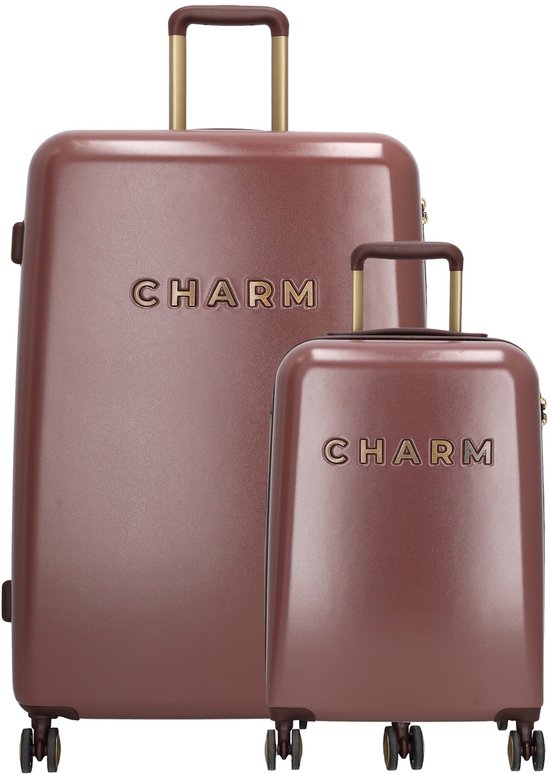 Twee bordeauxrode Charm koffers, groot en handbagageformaat, op witte achtergrond.
