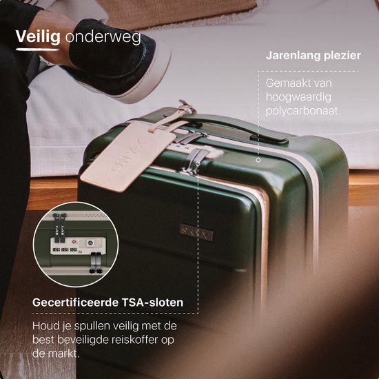 Groene koffer met details van het gecertificeerde TSA-slot. Gemaakt van hoogwaardig polycarbonaat.
