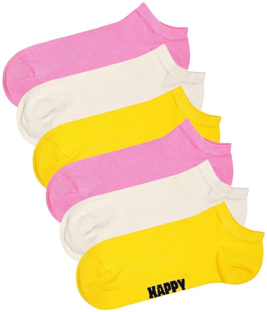 Set van zes enkelsokken in het roze, gebroken wit en geel. Één gele sok heeft het woord "HAPPY" in zwarte letters.