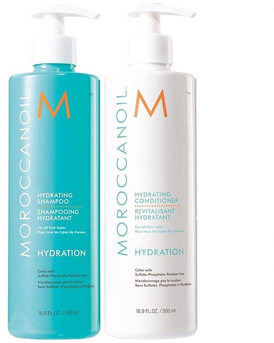 Moroccanoil Hydrating Shampoo en flacon turquoise et Hydrating Conditioner en flacon blanc, tous deux avec logo M orange et pompe blanche.