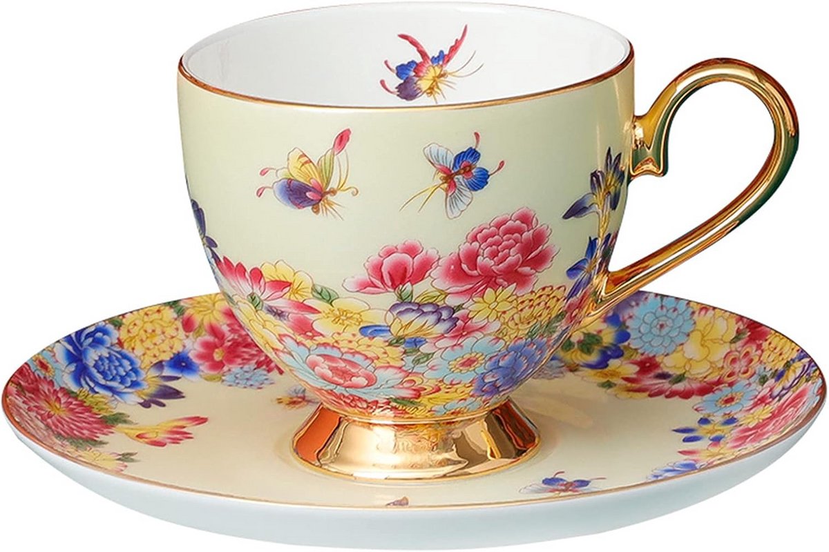Set van een koffiemok, houten onderzetter en lepel met een vrolijk vlindermotief