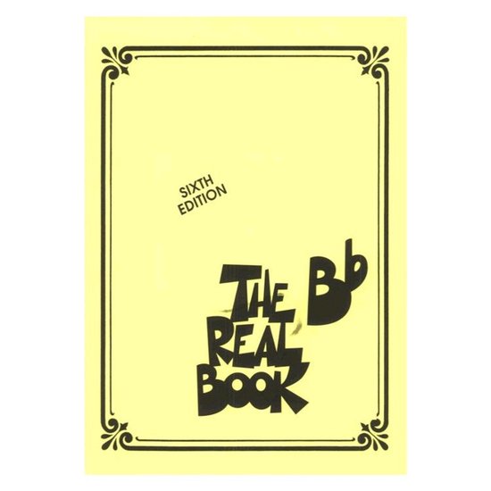 Gele omslag van The Real Book, Sixth Edition, met sierlijke rand.