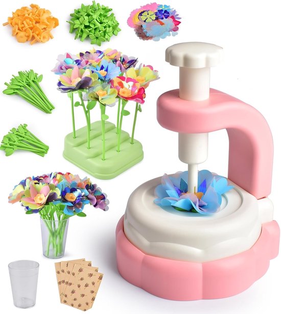 Une machine à fabriquer des fleurs rose avec de nombreuses fleurs colorées, un vase, des cœurs de fleurs et des tiges.
