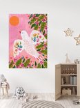 Grote IXXI muurposter met witte vogel en kleurrijke bloemen, geplaatst in een speelhoek.