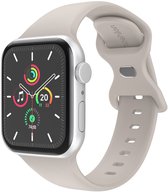 Lichtgrijs siliconen bandje om een Apple Watch, met imoshion logo op de band.