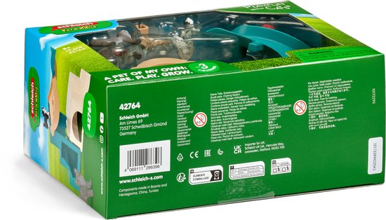 Zijkant van de Schleich kattenspeelgoeddoos met waarschuwingen, adresgegevens en productinformatie.