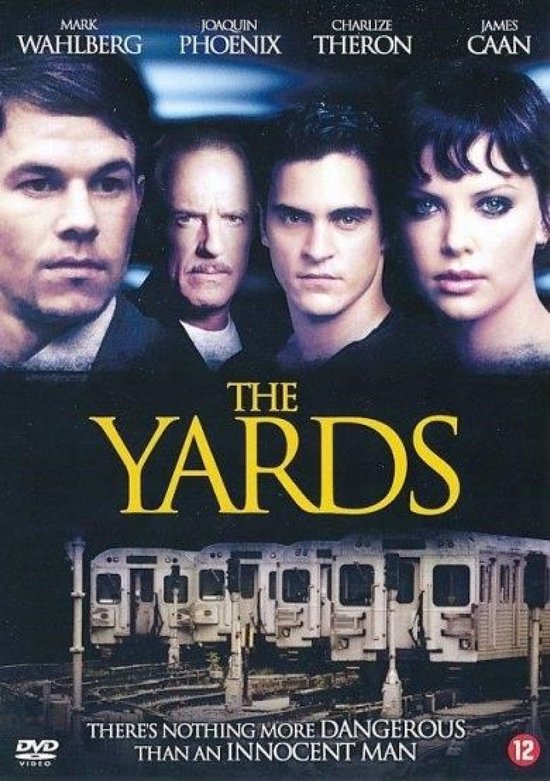 Poster voor de film 'The Yards' met Mark Wahlberg, Joaquin Phoenix, Charlize Theron en James Caan, met treinen op de achtergrond.