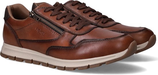 Bruine leren sneaker met veters, ritssluiting en beige zool.