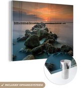 MuchoWow® Glasschilderij 80x60 cm - Schilderij acrylglas - Zee - Zon - Stenen - Foto op glas - Schilderijen